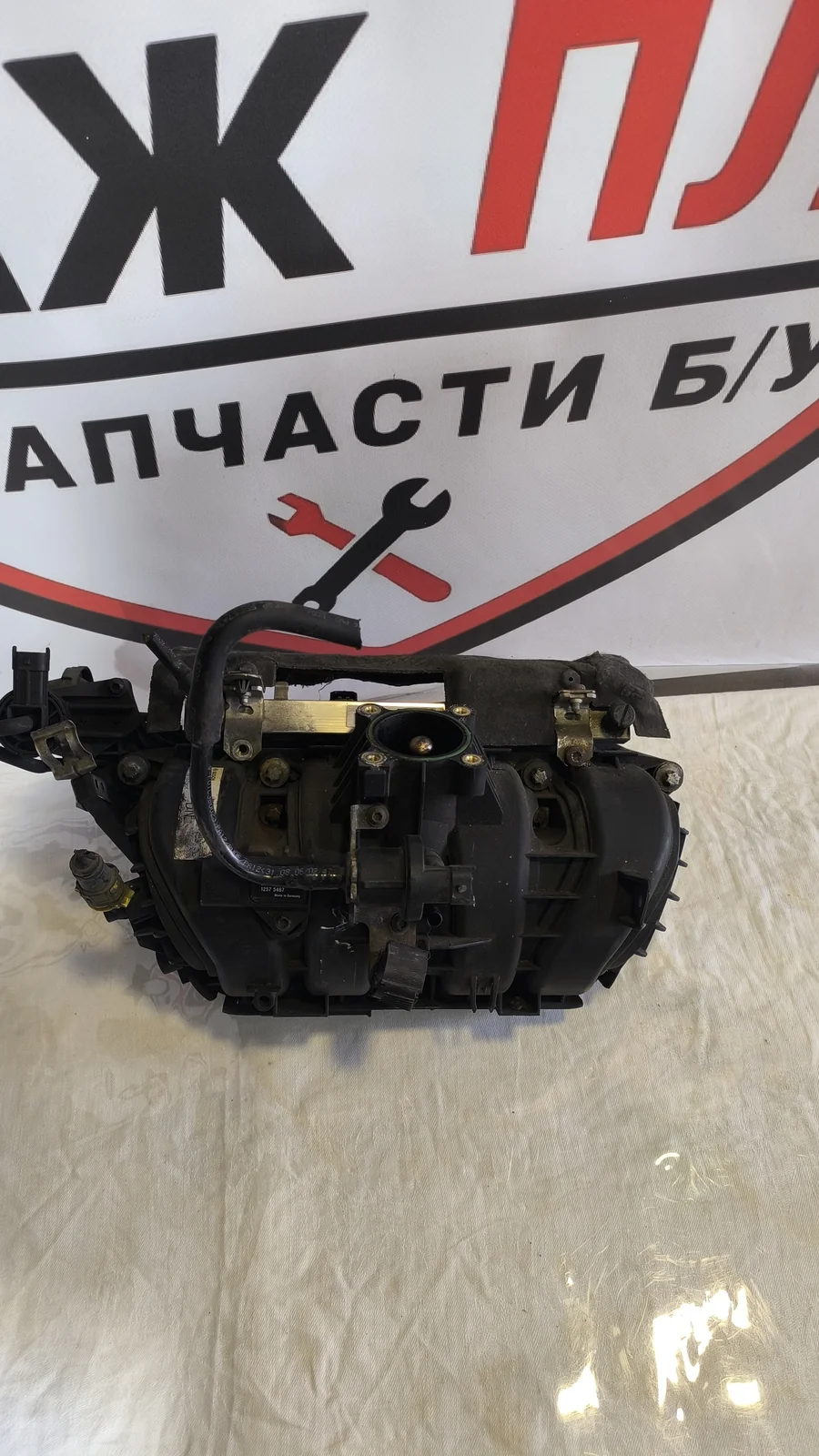 Коллектор впускной Opel Corsa D 1.2